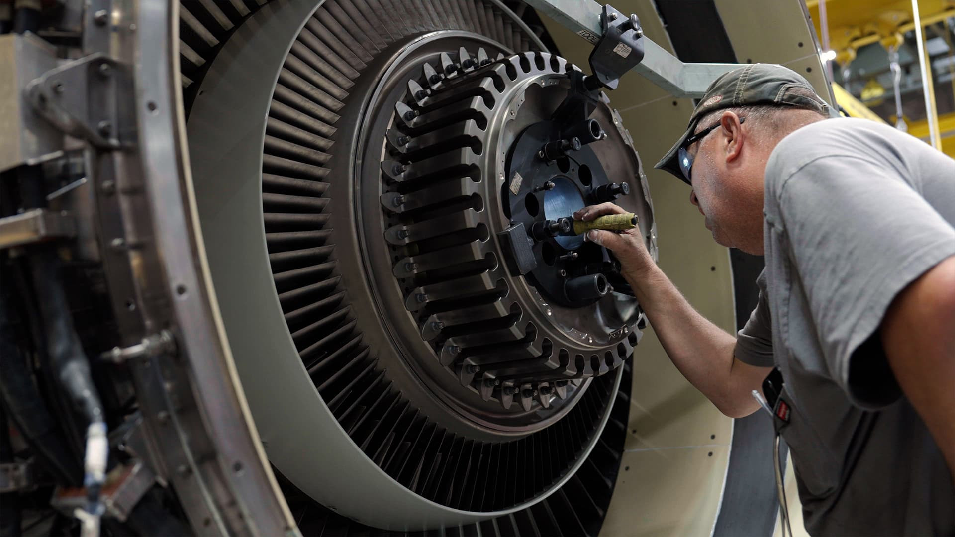 American Airlines aircraft engine undergoing maintenance. Efficient engine upkeep is crucial for airlines operating flights to Europe.
