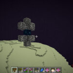 Using an Ender Pearl to enter the gateway to the outer End Islands.