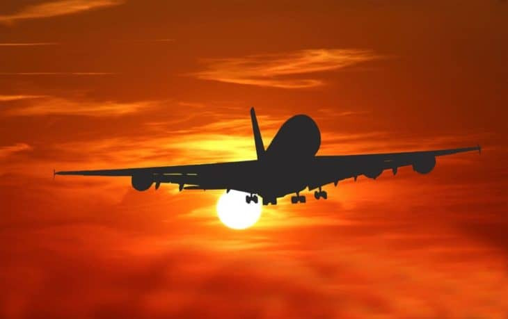 Airplane in Sunset Stratosphere Flight