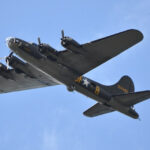 The restored movie version of the Memphis Belle flies over an airport in Tampa, Fla. (FOX photo)