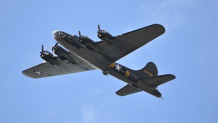 The restored movie version of the Memphis Belle flies over an airport in Tampa, Fla. (FOX photo)