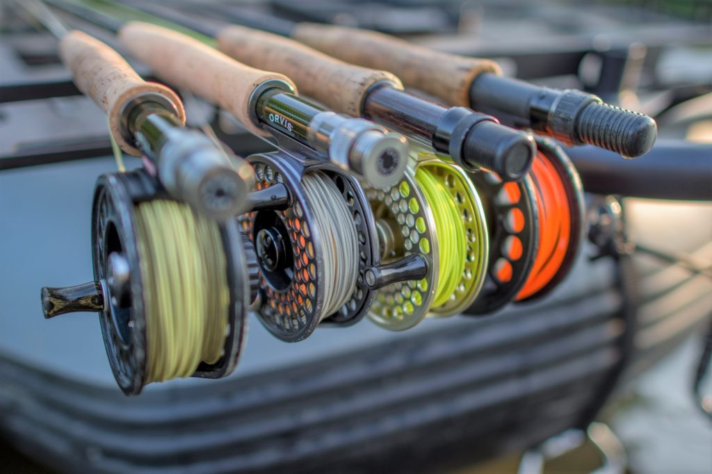 alt text: Fly fisherman wearing polarized sunglasses