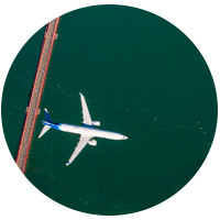 An icon representing flight booking, highlighting the ease of booking international flights on Alaska Airlines.