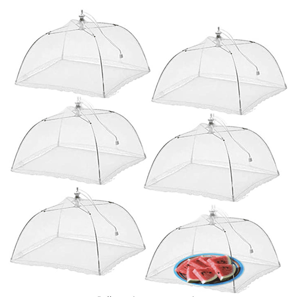 Food tents covering dishes at an outdoor picnic, preventing flies from reaching the food