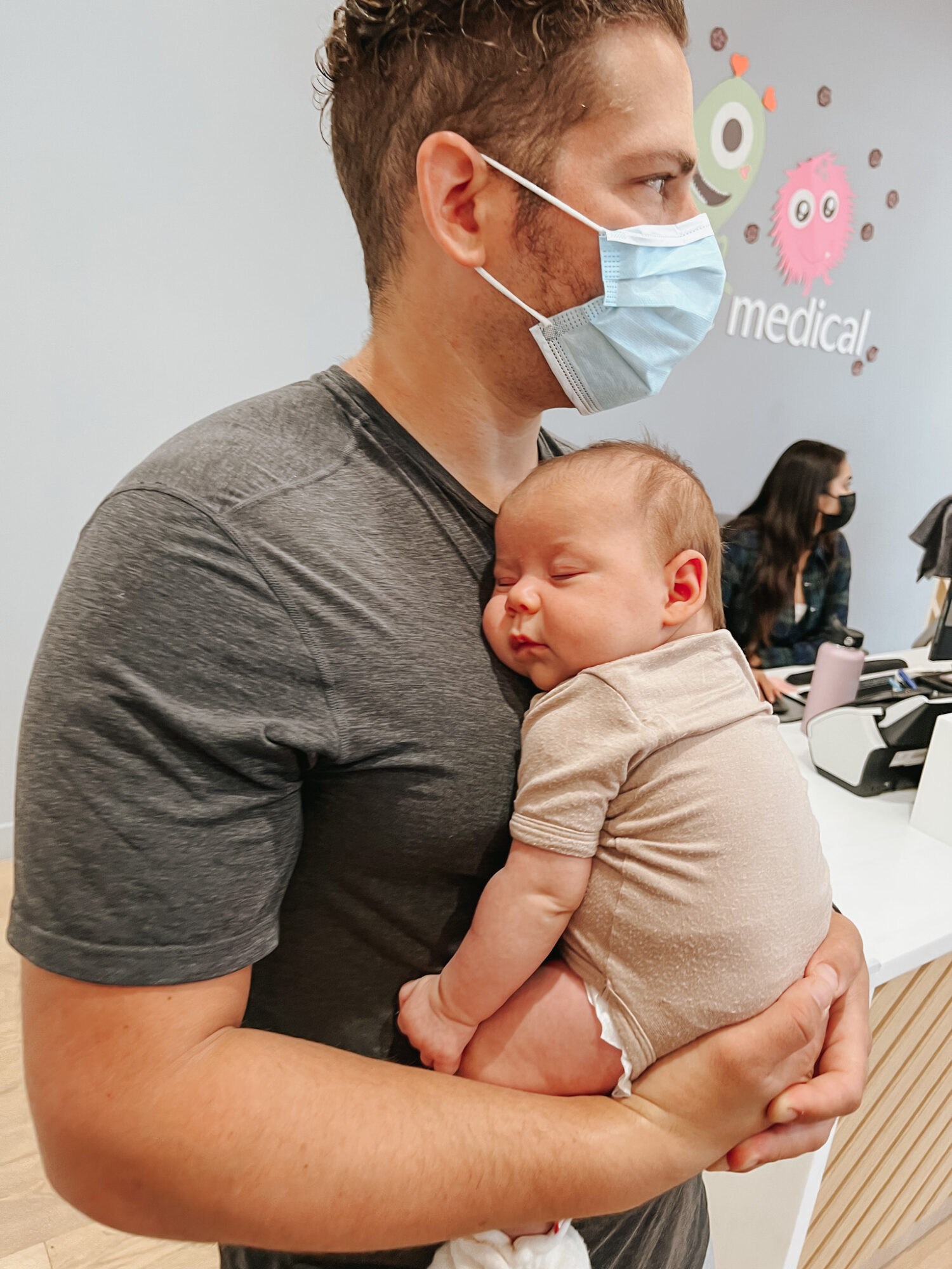 Close-up of 2-month baby vaccinations being administered by a doctor