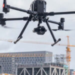 Construction worker Flying DJI m300 drone