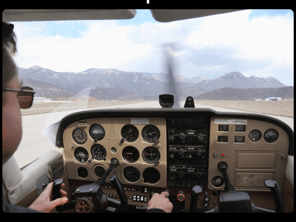 Pilot in Cockpit Preparing for Takeoff