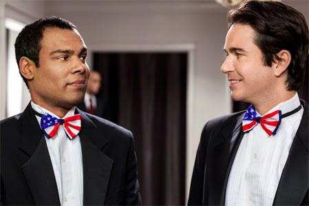 Men in red, white, and blue bow ties and cummerbunds