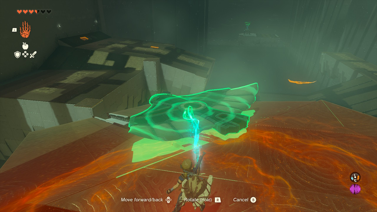Link using Ultrahand to maneuver a wing down a slope in the Jirutagumac Shrine, initiating the first flying device challenge in Zelda Tears of the Kingdom.