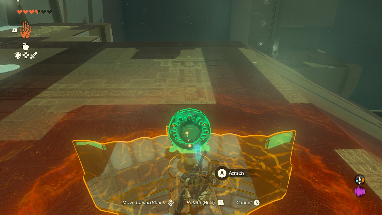 Link attaching a fan to the back of a wing in the Jirutagumac Shrine, completing the construction of a powered flying device in Zelda Tears of the Kingdom.