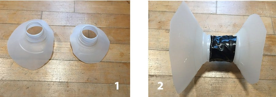 Tops of two plastic milk jugs, connected (Steps 1 and 2)