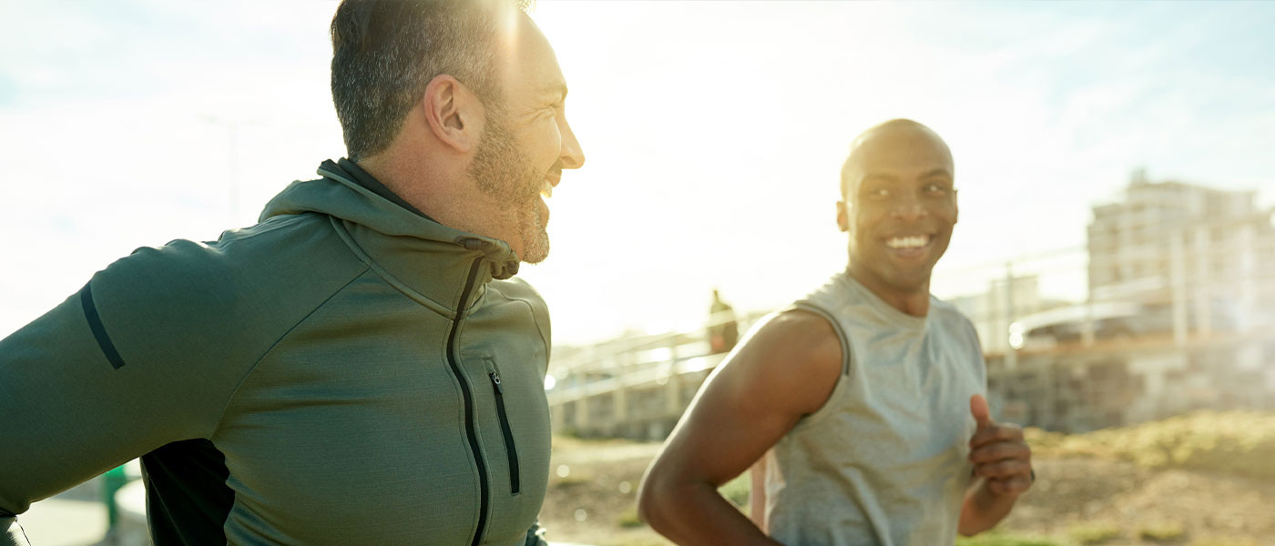 Friends enjoying a walk, representing the benefits of medical weight loss programs in promoting an active lifestyle, courtesy of Genesis Lifestyle Medicine
