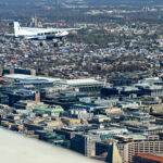 AOPA President Mark Baker in his historic Beechcraft Staggerwing leading the DC Flyover formation.