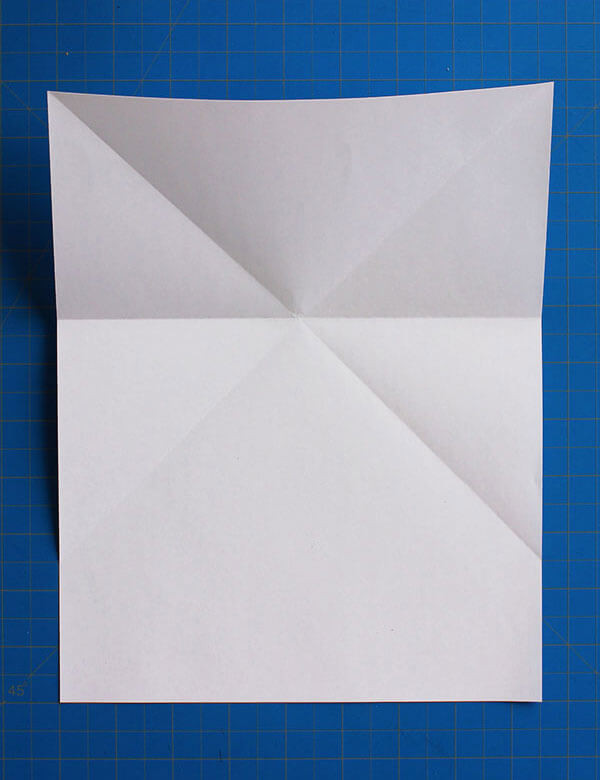 Step 4: Unfolding and flattening the paper to ensure well-defined creases for guiding the next steps