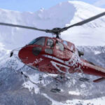Eurocopter AS350 B2 helicopter flying in the mountains