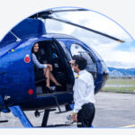 Helicopter tour over a city, showcasing aviation tourism and aerial views