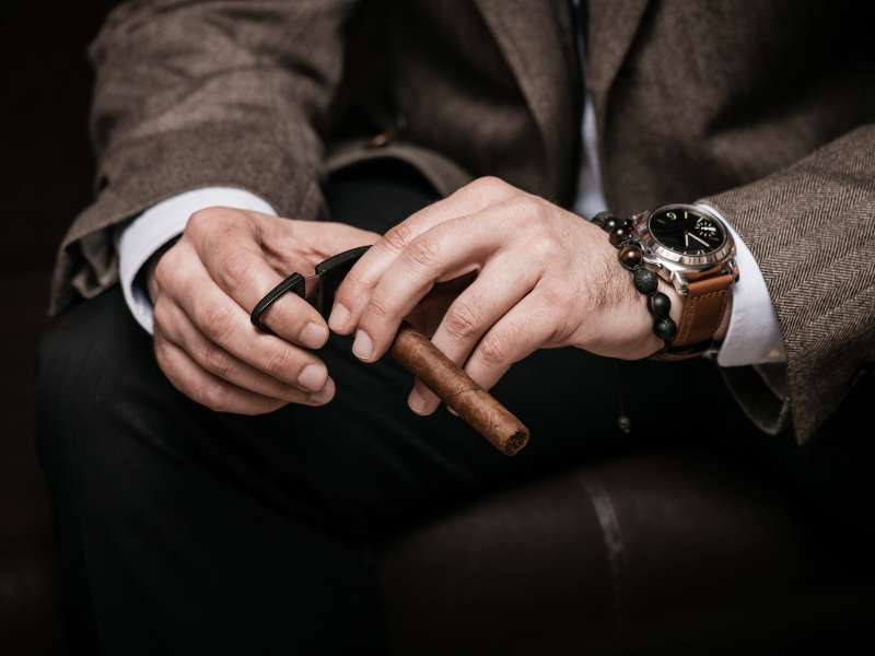 Cigar Aficionado Preparing His Cigars for Travel