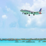 American Airlines airplane over Chalk Sound
