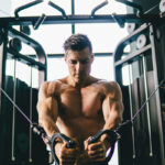 Man performing cable chest fly with proper form