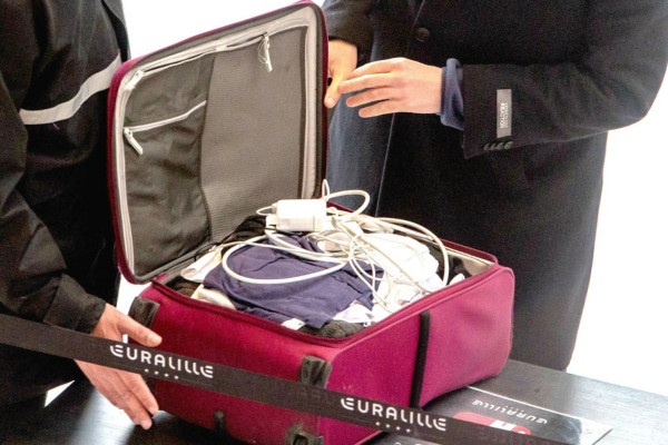 Tweezers in checked luggage