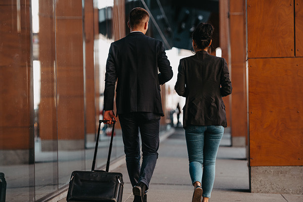 Chauffeur Assisting Client with Luggage in Mesa, AZ