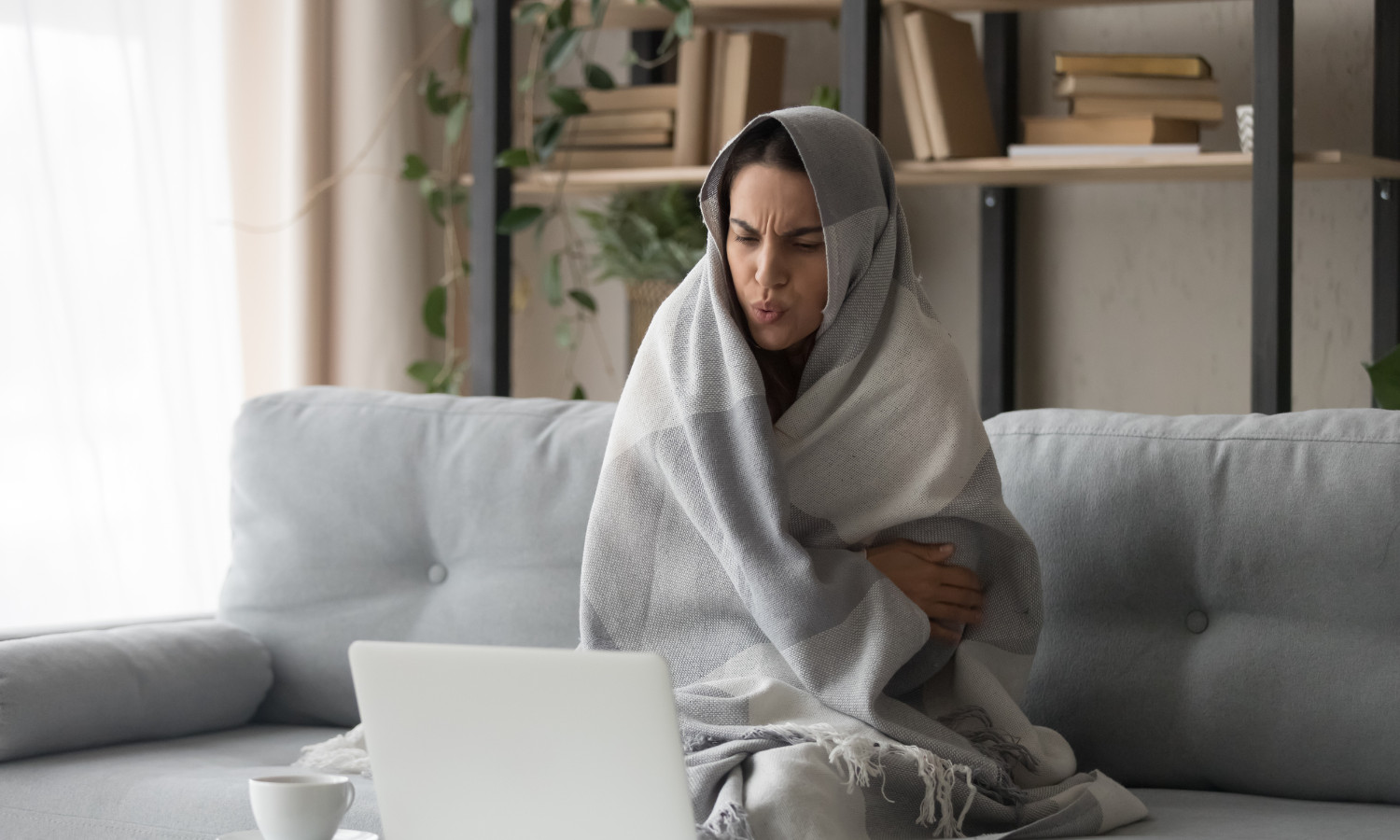 Woman wrapped in a blanket