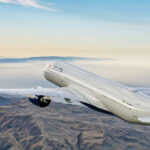 Delta Air Lines plane flying over mountains