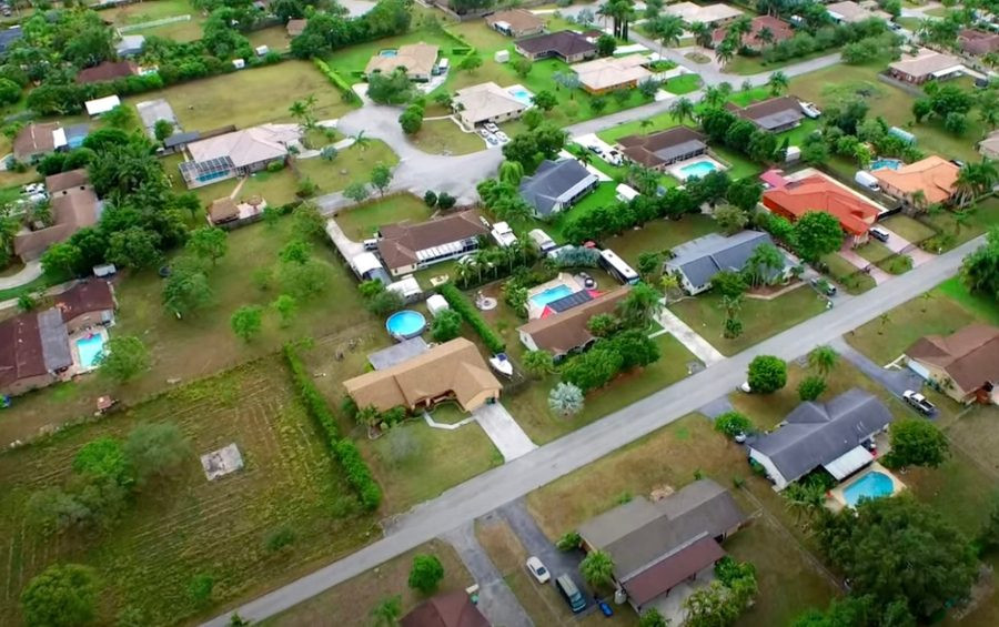 Drone flying over a suburban neighborhood