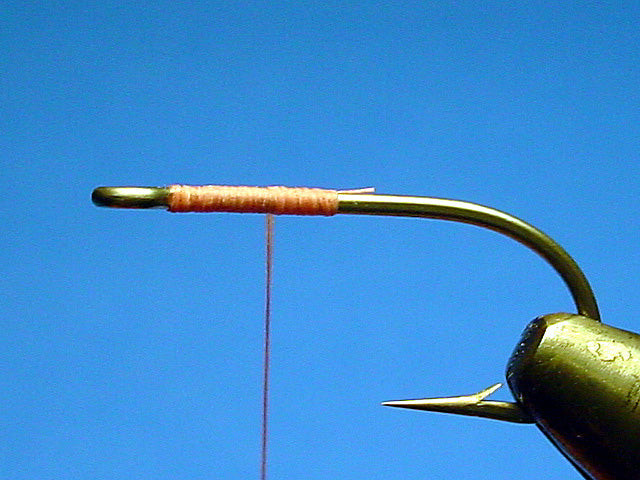 Thread base on the hook shank