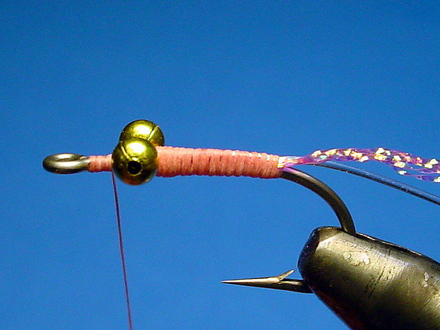 Krystal Flash wrapped to the hook bend