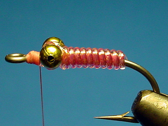 V-Rib wrapped forward and secured around the eyes