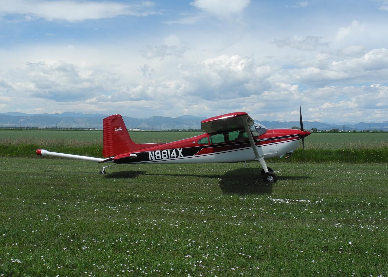 Military Aircraft equipped with an elongated stinger mounted to the underside of the cabin extending behind the airplane