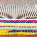 Weaving with a flying shuttle makes intricate carpet designs more manageable.