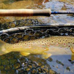 Nymphing fly fishing rod with net