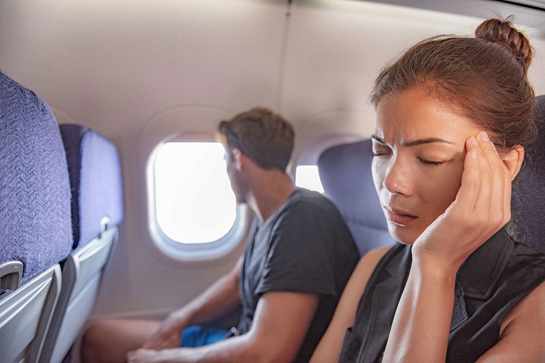 Patient experiencing vertigo on a plane