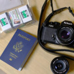 A camera, passport and film.