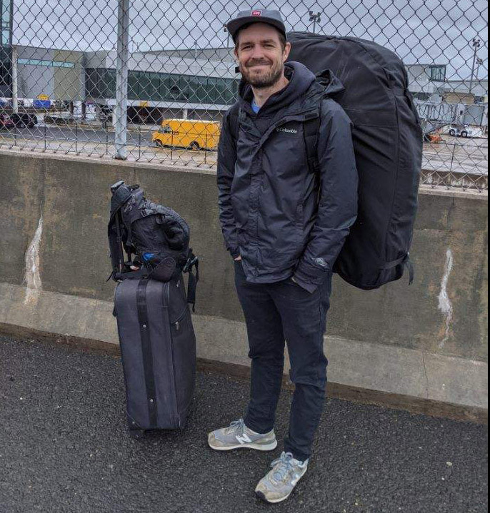 The author preparing for a flight with his bike in an Orucase *Airport Ninja* bag