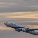 An El Al passenger aircraft takes off, symbolizing El Al's commitment to continuous flight operations.