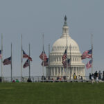 American flag flying at half-mast