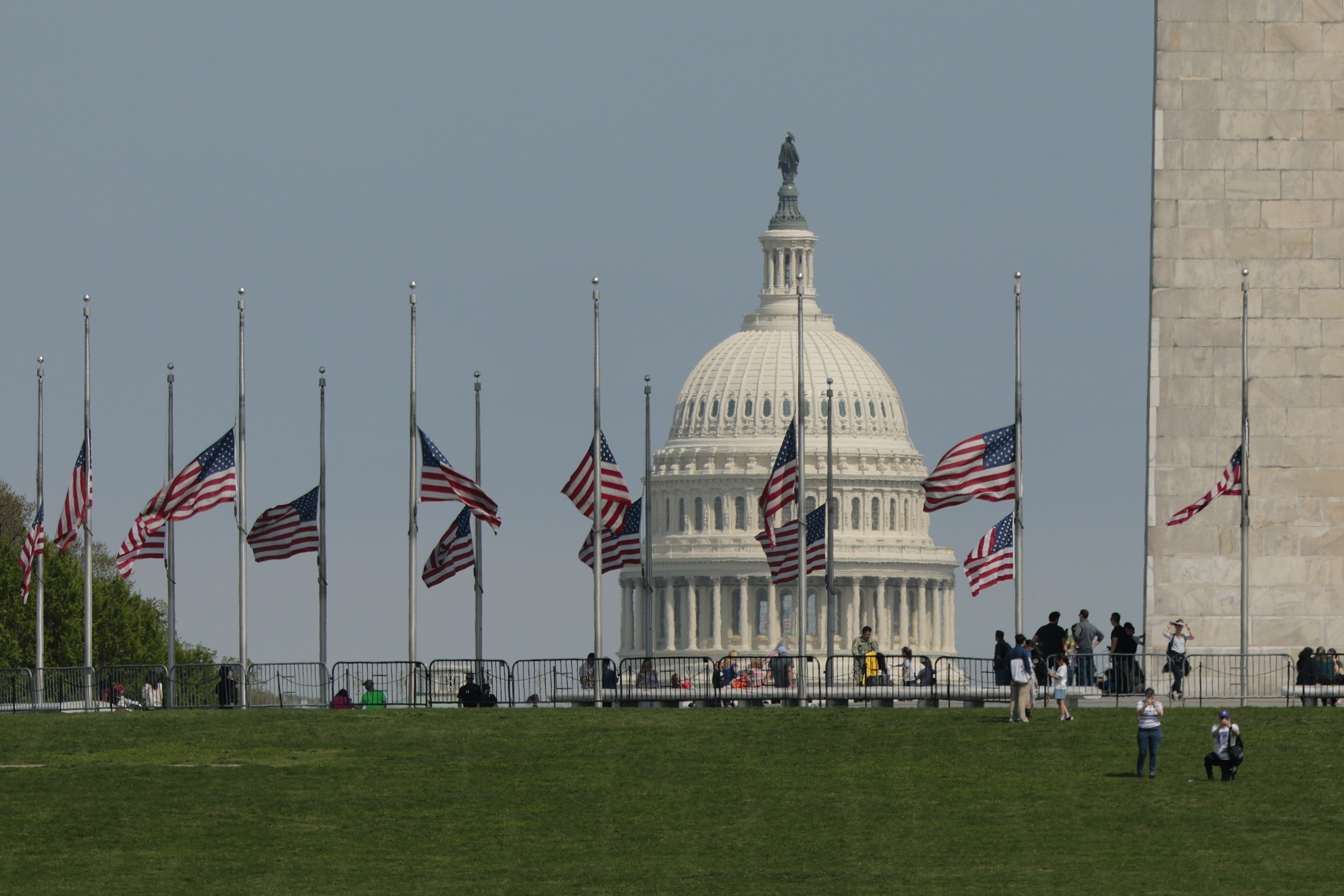 American flag flying at half-mast