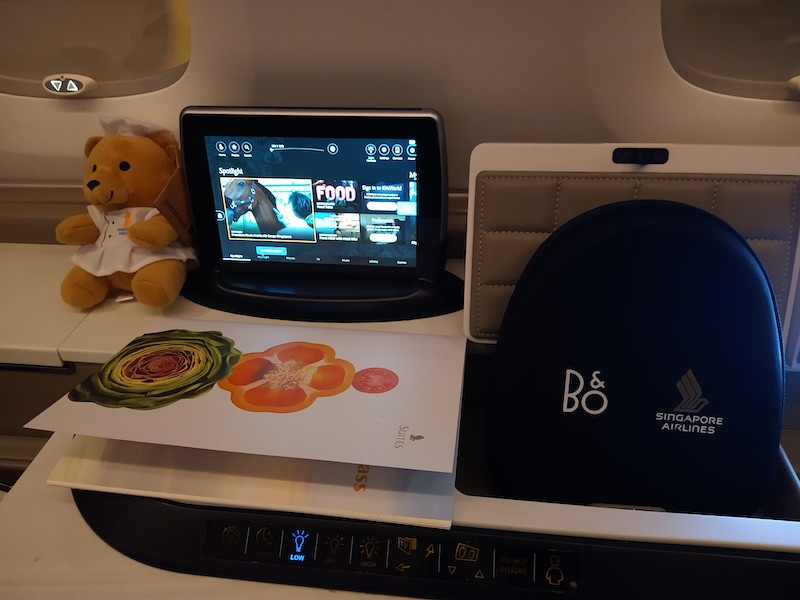 The iPads near the window can call an attendant or control the giant TVs that face where the bed in these Suites go