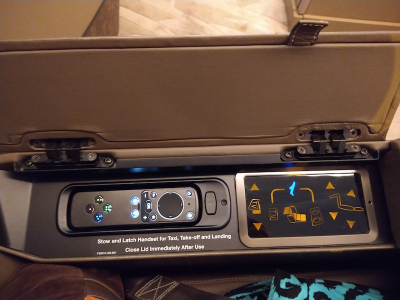 Control panel under the seat