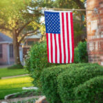 American Flag Displayed Vertically on a House