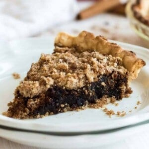A piece of shoofly pie on a white plate