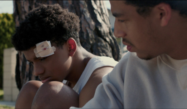 Marcus Scribner as Daniel in "How I Learned to Fly", showcasing the emotional depth of his character as he navigates the challenges of caring for his younger brother while striving for a better future.
