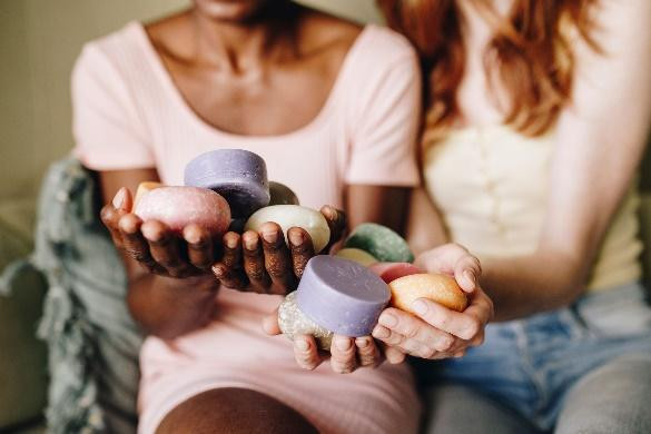 A woman holding soap