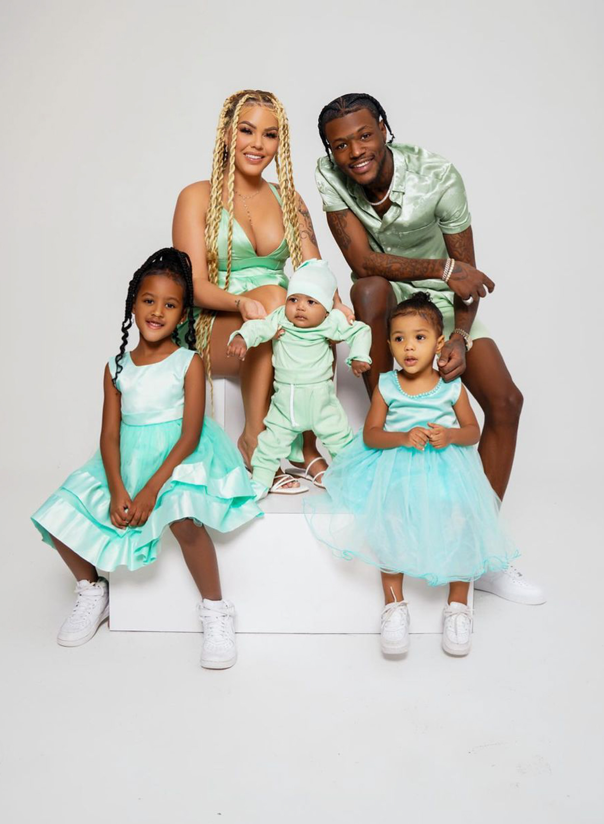 Jacky Oh and D.C. Young Fly with their three children.
