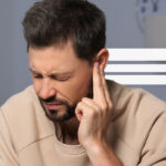 Airplane ear illustration showing pressure difference