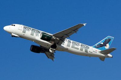 Frontier Airlines Airbus A320-214 showcasing &quot;Freedom the Bald Eagle&quot; animal tail, promoting brand recognition, environmental awareness, and enhanced passenger engagement for increased brand loyalty.