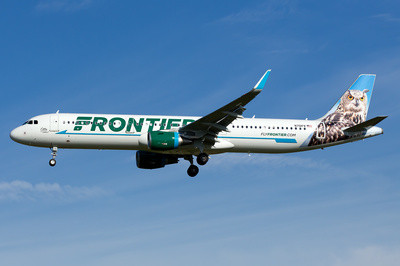 Frontier Airlines Airbus A321-211 showcasing &quot;Otto the Owl&quot; animal tail, highlighting the aircraft's role in serving high-demand routes with increased passenger capacity.